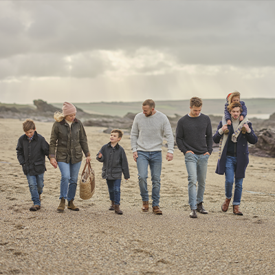 Christmas in Cornwall 6 Family walking on the beach